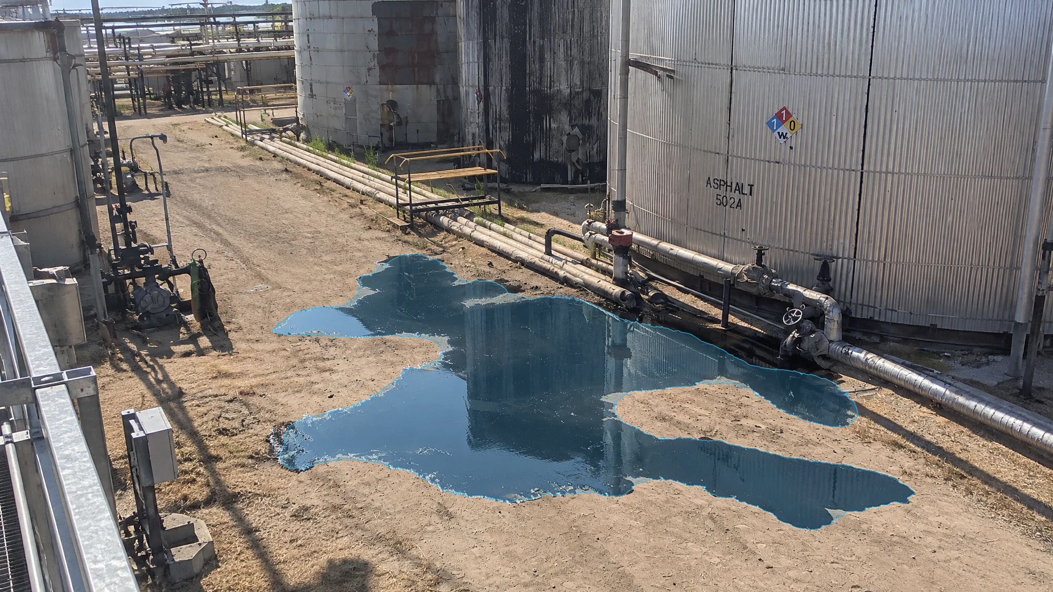 Real V4 detection, processed live: Tank farm, puddle detected. Overlay output of VisionAery Liquid Leak Detection.