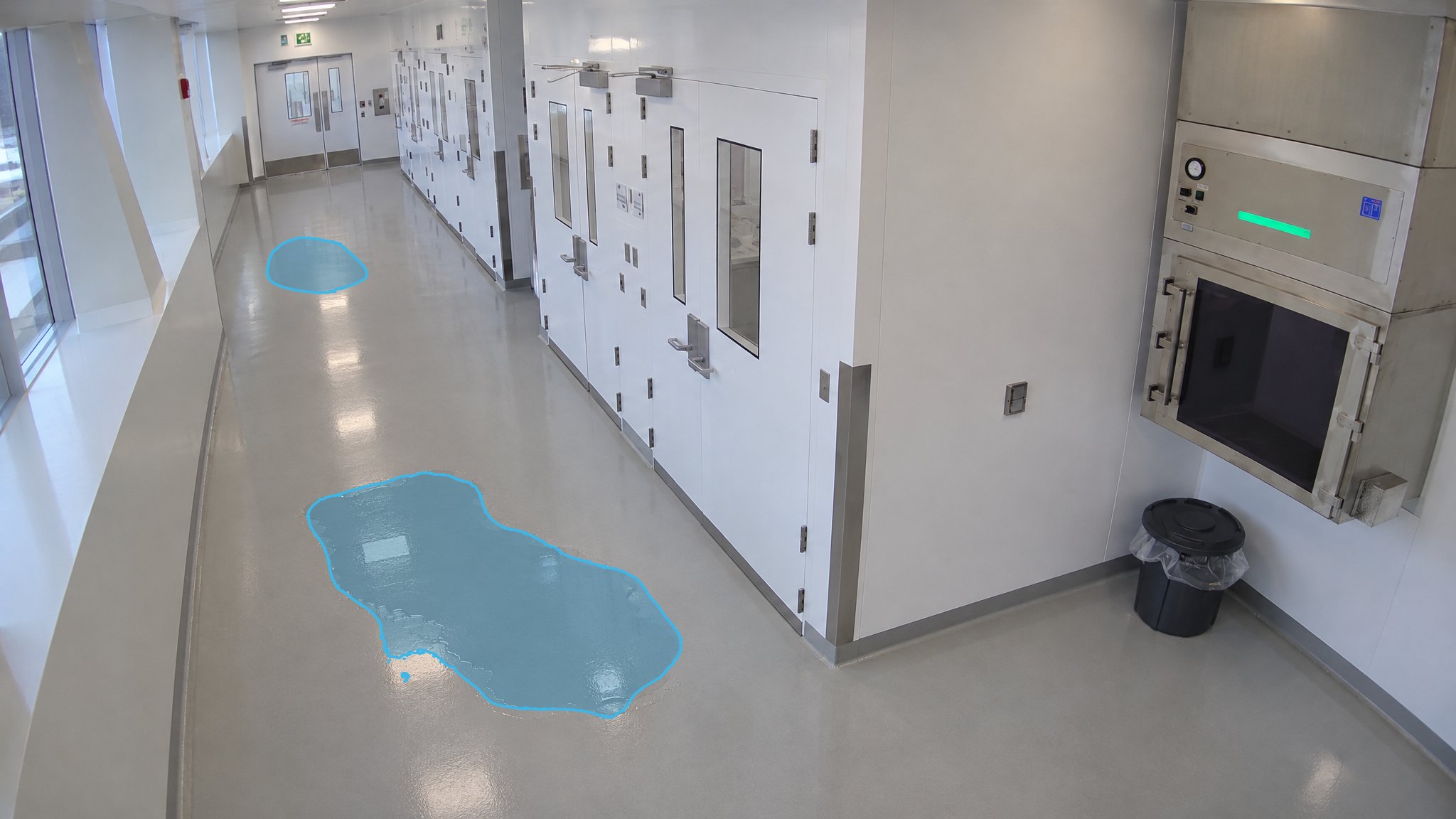 Facility Hallway Fluid Spill — puddle detection overlay