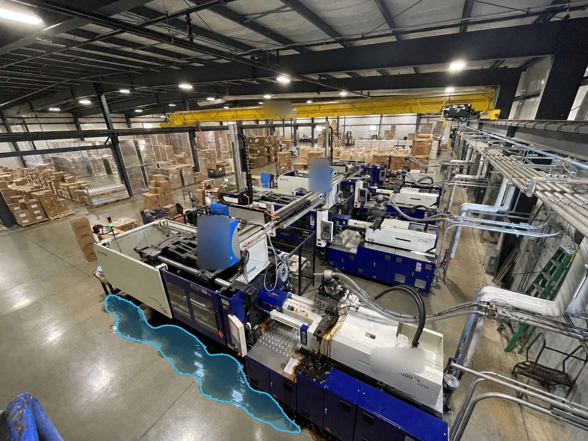 Manufacturing Hydraulic Fluid Leak — puddle detection overlay